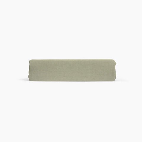 Avec linen classic top sheet in sage folded neatly on a white background