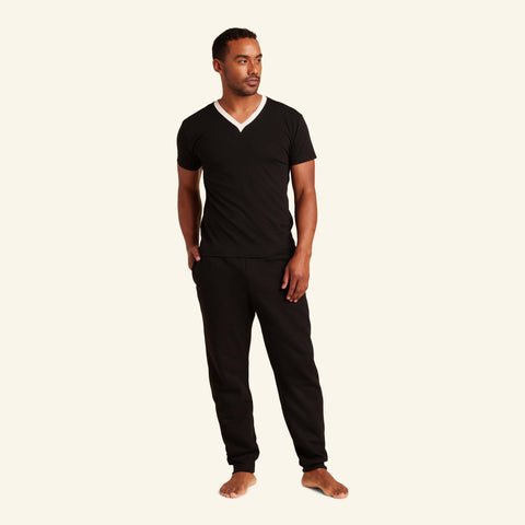 Man wearing the Slumber Cloud Essential V-Neck made with Outlast temperature regulation technology