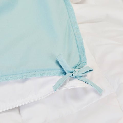 A detailed view of the corner ties on the Slumber Cloud Essential Duvet Cover